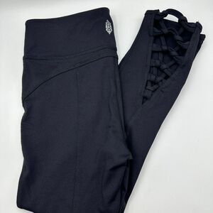 Free People Movement Yoga Capri Leggings Women S Black Elastic Waist Cut Out Hem